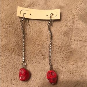 Rhinestone and skeleton earrings